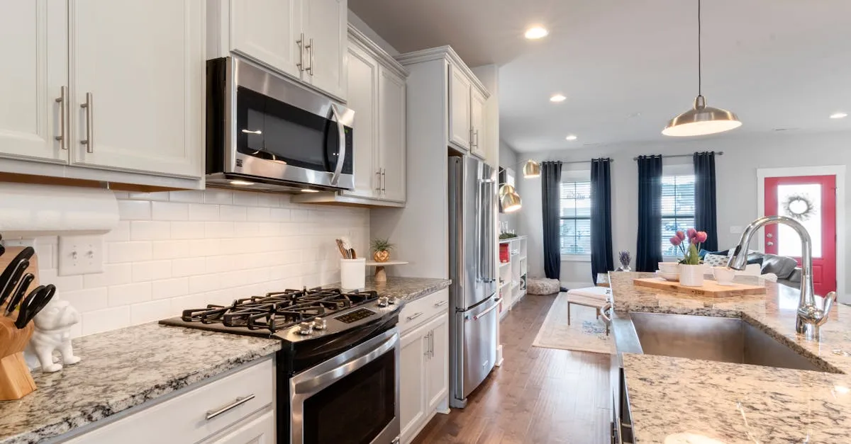 Bright modern kitchen featuring granite countertops and stainless steel appliances